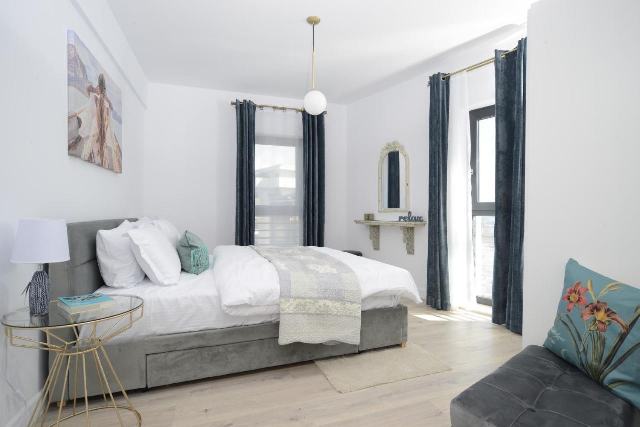 The Clock Apartment Voluntari Bagian luar foto